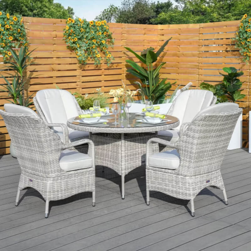 Rattan Table and Chair Set on Sandstone Paving Slabs